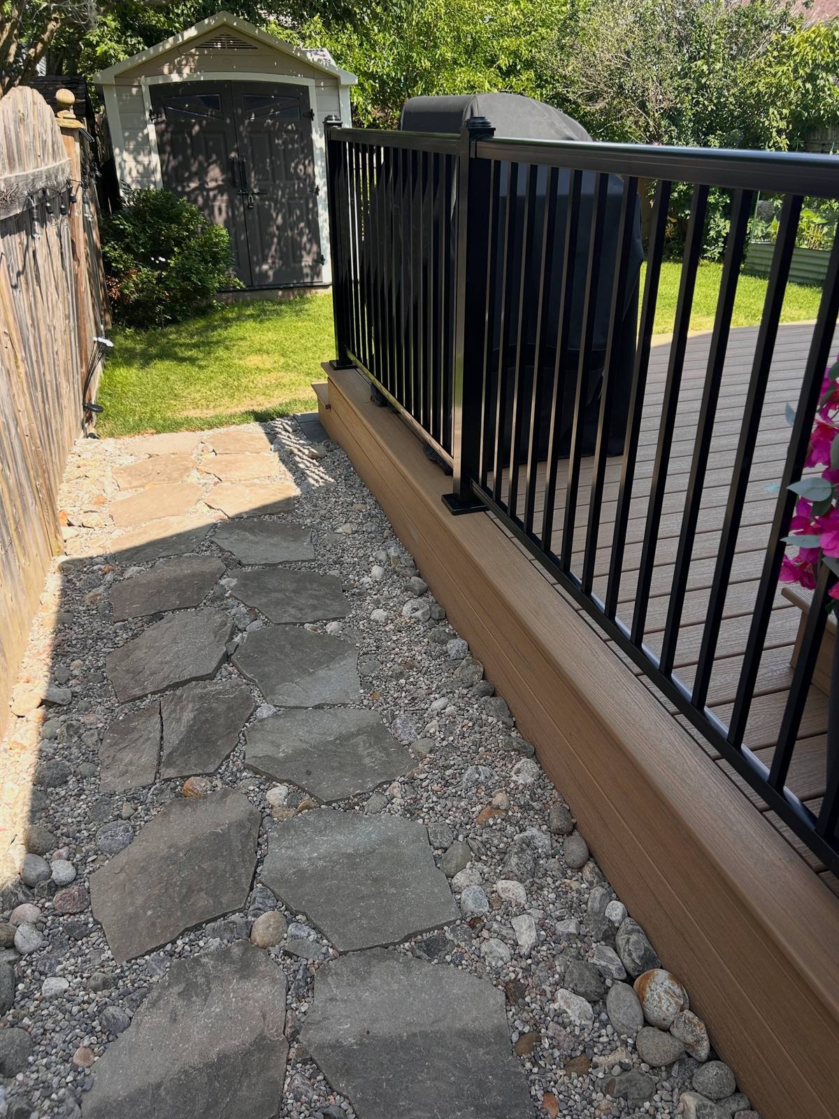 Composite deck with lounge seating in Kingston, Ontario